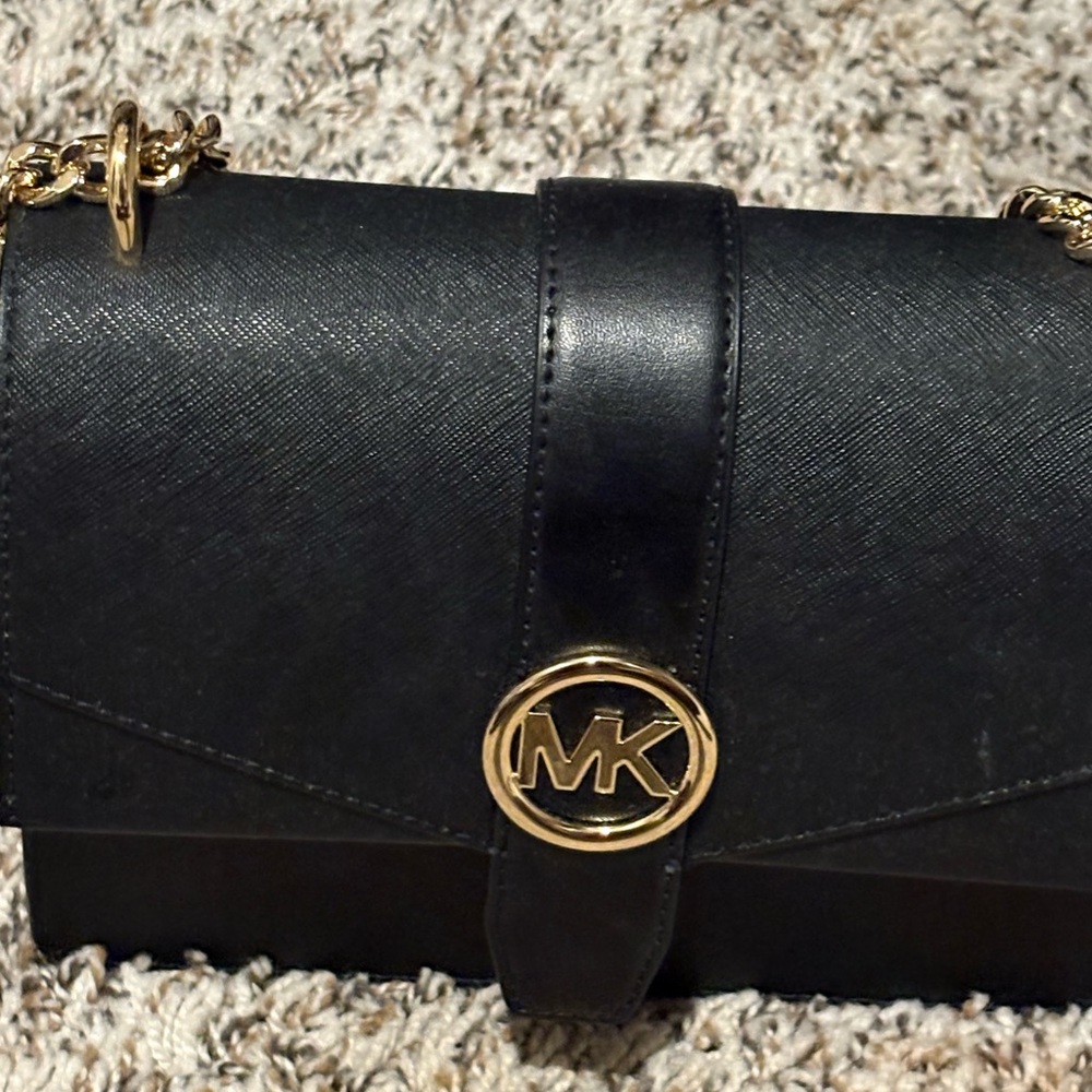 Michael Kors Black and Gold Crossbody Bag with Sleek Design